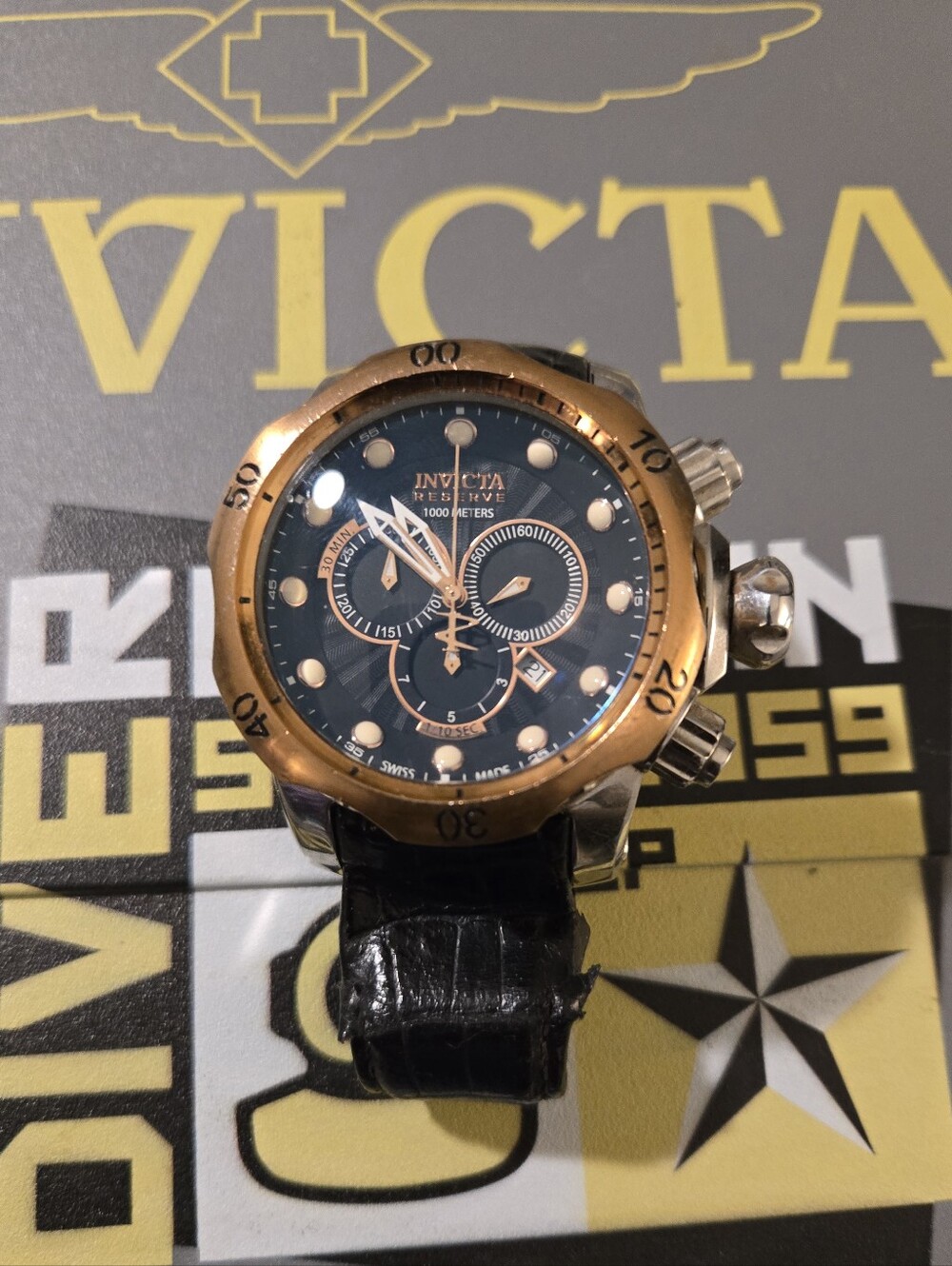 Invicta Gold and Black Chronograph Watch with Black Leather Strap. Needs Strsp